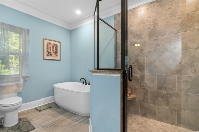 Welcome to this stunning all-brick home nestled on a private 1 on Wachesaw Plantation Club in South Carolina - for sale on GolfHomes.com, golf home, golf lot