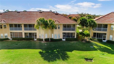Second-floor end unit with a peaceful lake view and extra on The Club At Grandezza in Florida - for sale on GolfHomes.com, golf home, golf lot