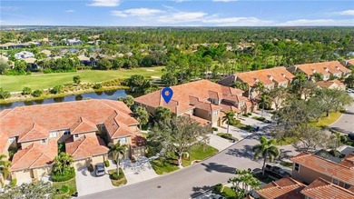 Second-floor end unit with a peaceful lake view and extra on The Club At Grandezza in Florida - for sale on GolfHomes.com, golf home, golf lot