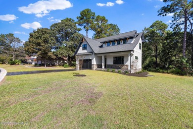 Stunning new construction in the desirable and gated community on Carolina National Golf Club in North Carolina - for sale on GolfHomes.com, golf home, golf lot