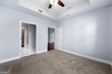 Discover the perfect blend of luxury and location in this on Bobby Jones Golf Club in Georgia - for sale on GolfHomes.com, golf home, golf lot