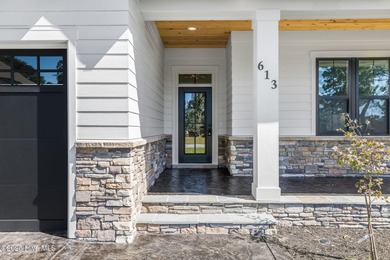 Stunning new construction in the desirable and gated community on Carolina National Golf Club in North Carolina - for sale on GolfHomes.com, golf home, golf lot