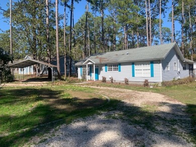TREMENDOUS PRICE IMPROVEMENT! Your boat could be home. Have you on St. James Bay in Florida - for sale on GolfHomes.com, golf home, golf lot