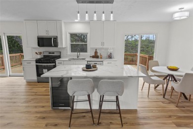 Welcome to this updated 5-bedroom 3-bath multi-level home with a on Tamarack Country Club in Illinois - for sale on GolfHomes.com, golf home, golf lot