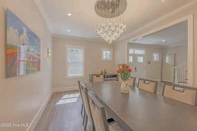 Upscale living with long golf views of Hole #3 of the on River Landing Golf Course in North Carolina - for sale on GolfHomes.com, golf home, golf lot