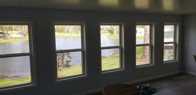 This large 1570 sq ft manufactured home on leased land has lots on Pine Lakes Country Club in Florida - for sale on GolfHomes.com, golf home, golf lot