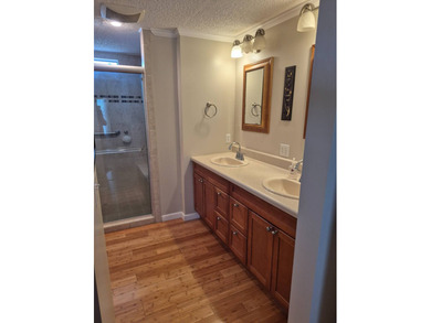 This large 1570 sq ft manufactured home on leased land has lots on Pine Lakes Country Club in Florida - for sale on GolfHomes.com, golf home, golf lot