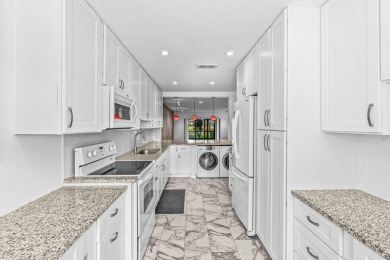 This move-in ready, first floor condo has been fully updated and on Hunters Run Golf and Country Club in Florida - for sale on GolfHomes.com, golf home, golf lot