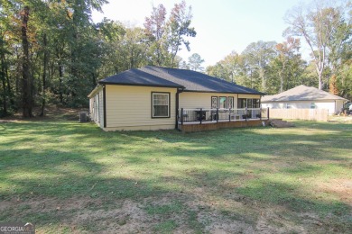 From Houston Road, Take Hartley Bridge Road, then turn right on Oakview Golf and Country Club in Georgia - for sale on GolfHomes.com, golf home, golf lot