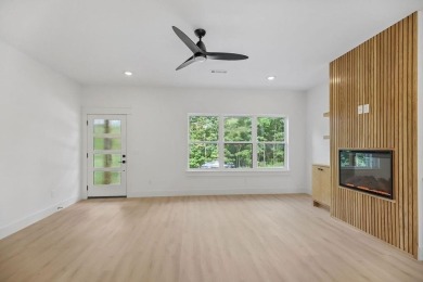 Discover modern living at its finest at 85 Rountree, located on Bella Vista Country Club - Berksdale in Arkansas - for sale on GolfHomes.com, golf home, golf lot