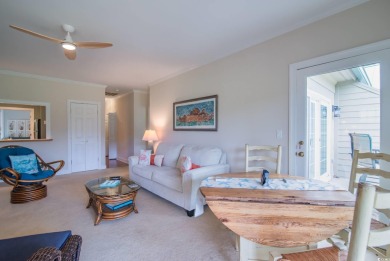 Second story end unit with sweeping views of Pawleys Plantation on  in South Carolina - for sale on GolfHomes.com, golf home, golf lot