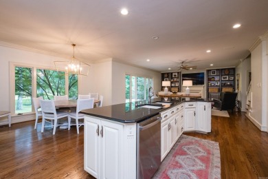 Experience luxury living in this stunning 2-story home nestled on Chenal Country Club - Bear Den Mountain in Arkansas - for sale on GolfHomes.com, golf home, golf lot