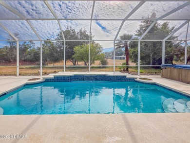 Beautiful 3-bedroom, 3-bath pool home, located in the exclusive on Halifax Plantation Golf Club in Florida - for sale on GolfHomes.com, golf home, golf lot