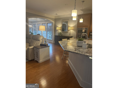 Welcome to this beautifully maintained home in the highly on Canongate Golf At Sun City Peachtree in Georgia - for sale on GolfHomes.com, golf home, golf lot