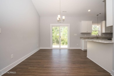Your dream home is nearing completion in the charming, gated on Harbour Point Golf Club in North Carolina - for sale on GolfHomes.com, golf home, golf lot