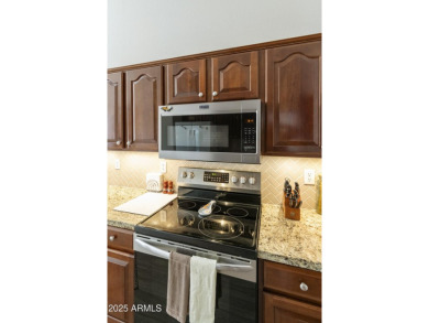 Updated 2BR, 2.5BA expanded Palacia model close to the clubhouse on Oakwood Golf Club  in Arizona - for sale on GolfHomes.com, golf home, golf lot