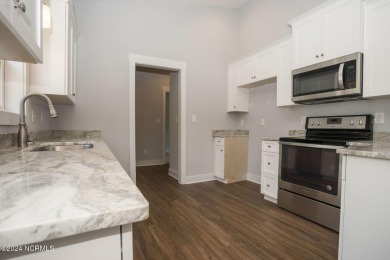Your dream home is nearing completion in the charming, gated on Harbour Point Golf Club in North Carolina - for sale on GolfHomes.com, golf home, golf lot