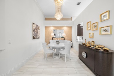 Experience timeless elegance and effortless living in this on BallenIsles Golf and Country Club in Florida - for sale on GolfHomes.com, golf home, golf lot