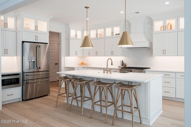 Welcome to your ideal coastal retreat! This beautiful 1.5 story on Crow Creek Golf Club in North Carolina - for sale on GolfHomes.com, golf home, golf lot