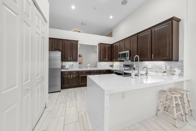 Experience timeless elegance and effortless living in this on BallenIsles Golf and Country Club in Florida - for sale on GolfHomes.com, golf home, golf lot