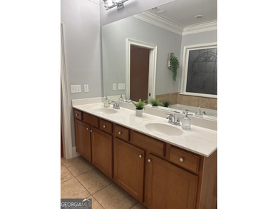 Welcome to this beautifully maintained home in the highly on Canongate Golf At Sun City Peachtree in Georgia - for sale on GolfHomes.com, golf home, golf lot