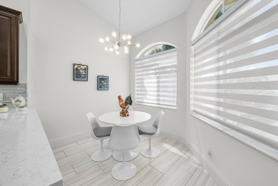 Experience timeless elegance and effortless living in this on BallenIsles Golf and Country Club in Florida - for sale on GolfHomes.com, golf home, golf lot