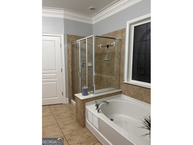 Welcome to this beautifully maintained home in the highly on Canongate Golf At Sun City Peachtree in Georgia - for sale on GolfHomes.com, golf home, golf lot