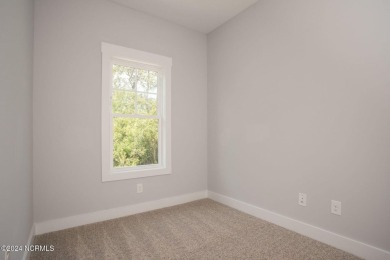 Your dream home is nearing completion in the charming, gated on Harbour Point Golf Club in North Carolina - for sale on GolfHomes.com, golf home, golf lot