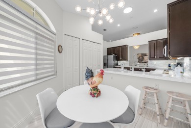 Experience timeless elegance and effortless living in this on BallenIsles Golf and Country Club in Florida - for sale on GolfHomes.com, golf home, golf lot