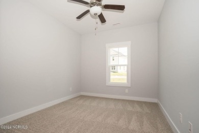 Your dream home is nearing completion in the charming, gated on Harbour Point Golf Club in North Carolina - for sale on GolfHomes.com, golf home, golf lot