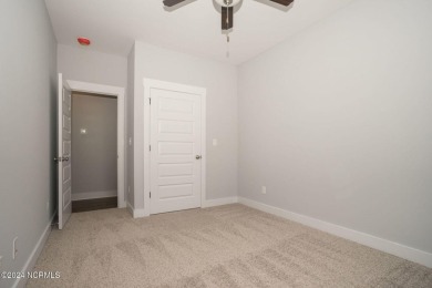Your dream home is nearing completion in the charming, gated on Harbour Point Golf Club in North Carolina - for sale on GolfHomes.com, golf home, golf lot
