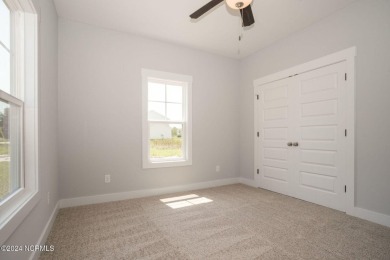 Your dream home is nearing completion in the charming, gated on Harbour Point Golf Club in North Carolina - for sale on GolfHomes.com, golf home, golf lot