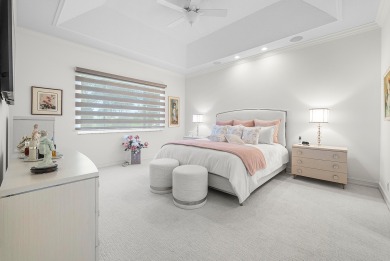 Experience timeless elegance and effortless living in this on BallenIsles Golf and Country Club in Florida - for sale on GolfHomes.com, golf home, golf lot
