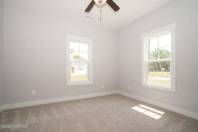 Your dream home is nearing completion in the charming, gated on Harbour Point Golf Club in North Carolina - for sale on GolfHomes.com, golf home, golf lot