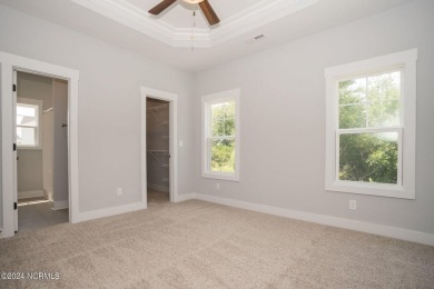 Your dream home is nearing completion in the charming, gated on Harbour Point Golf Club in North Carolina - for sale on GolfHomes.com, golf home, golf lot