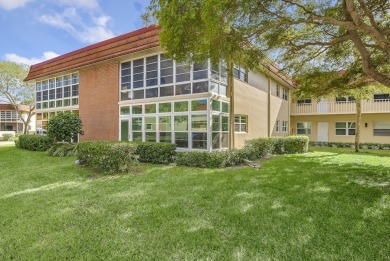 Coveted 1st-floor complete with full remodel! Impact glass on The American Golf Club in Florida - for sale on GolfHomes.com, golf home, golf lot