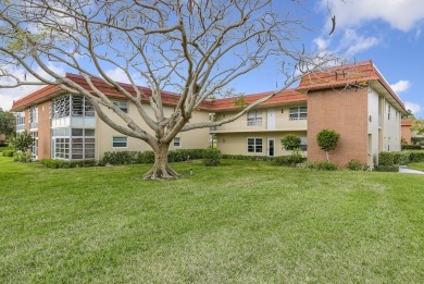 Coveted 1st-floor complete with full remodel! Impact glass on The American Golf Club in Florida - for sale on GolfHomes.com, golf home, golf lot