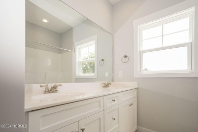 Your dream home is nearing completion in the charming, gated on Harbour Point Golf Club in North Carolina - for sale on GolfHomes.com, golf home, golf lot