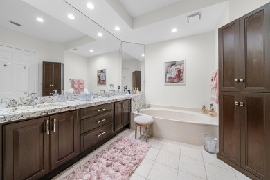 Experience timeless elegance and effortless living in this on BallenIsles Golf and Country Club in Florida - for sale on GolfHomes.com, golf home, golf lot