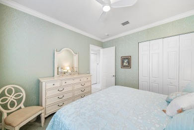 Experience timeless elegance and effortless living in this on BallenIsles Golf and Country Club in Florida - for sale on GolfHomes.com, golf home, golf lot
