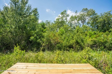 Your dream home is nearing completion in the charming, gated on Harbour Point Golf Club in North Carolina - for sale on GolfHomes.com, golf home, golf lot