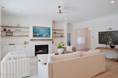 Welcome to your ideal coastal retreat! This beautiful 1.5 story on Crow Creek Golf Club in North Carolina - for sale on GolfHomes.com, golf home, golf lot