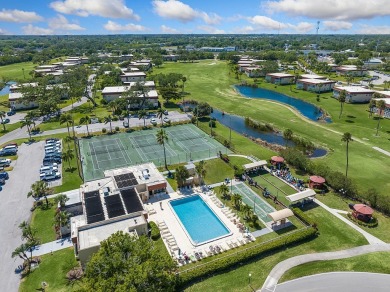 Coveted 1st-floor complete with full remodel! Impact glass on The American Golf Club in Florida - for sale on GolfHomes.com, golf home, golf lot