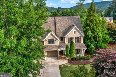 Welcome to your dream home tucked on a serene cul-de-sac lot in on The Highlands Course at Lake Arrowhead in Georgia - for sale on GolfHomes.com, golf home, golf lot