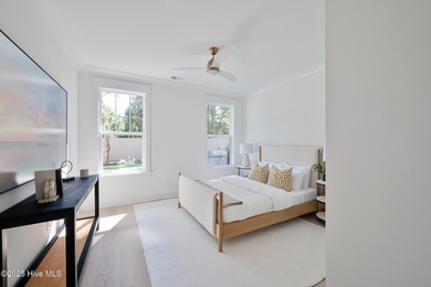 Welcome to your ideal coastal retreat! This beautiful 1.5 story on Crow Creek Golf Club in North Carolina - for sale on GolfHomes.com, golf home, golf lot