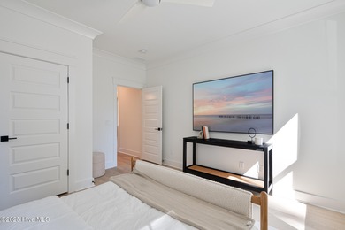 Welcome to your ideal coastal retreat! This beautiful 1.5 story on Crow Creek Golf Club in North Carolina - for sale on GolfHomes.com, golf home, golf lot