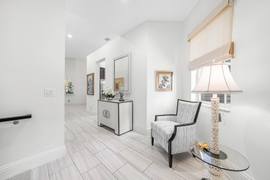 Experience timeless elegance and effortless living in this on BallenIsles Golf and Country Club in Florida - for sale on GolfHomes.com, golf home, golf lot