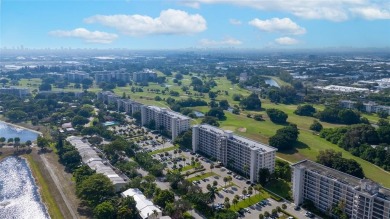 Step into this lower penthouse condo where vintage charm meets on Palm-Aire Country Club and Resort - Palms in Florida - for sale on GolfHomes.com, golf home, golf lot