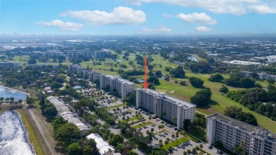 Step into this lower penthouse condo where vintage charm meets on Palm-Aire Country Club and Resort - Palms in Florida - for sale on GolfHomes.com, golf home, golf lot