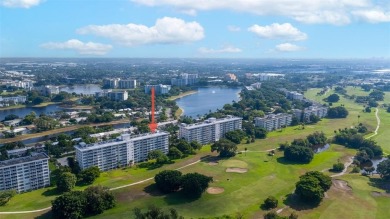 Step into this lower penthouse condo where vintage charm meets on Palm-Aire Country Club and Resort - Palms in Florida - for sale on GolfHomes.com, golf home, golf lot